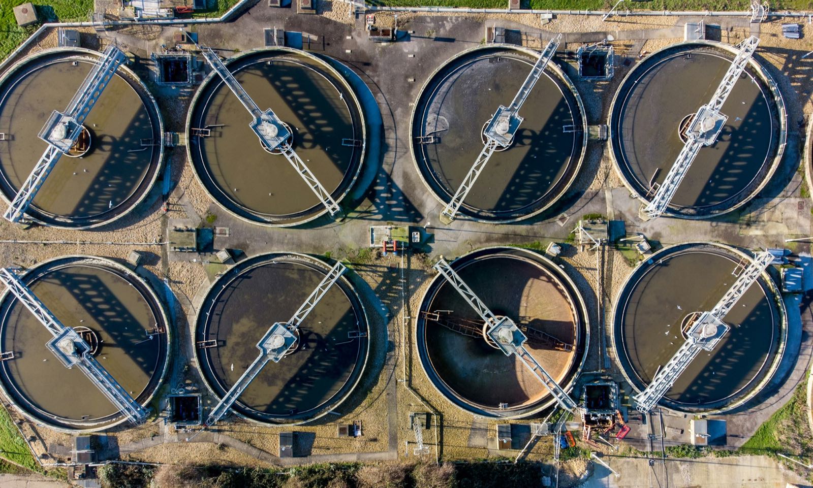 Circular clarifier tanks seen from the air